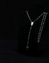 Silver rosary with gold