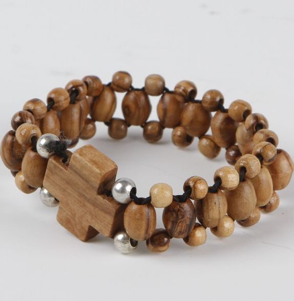 Elastic olive wood rosary bracelet with cross and silver bead